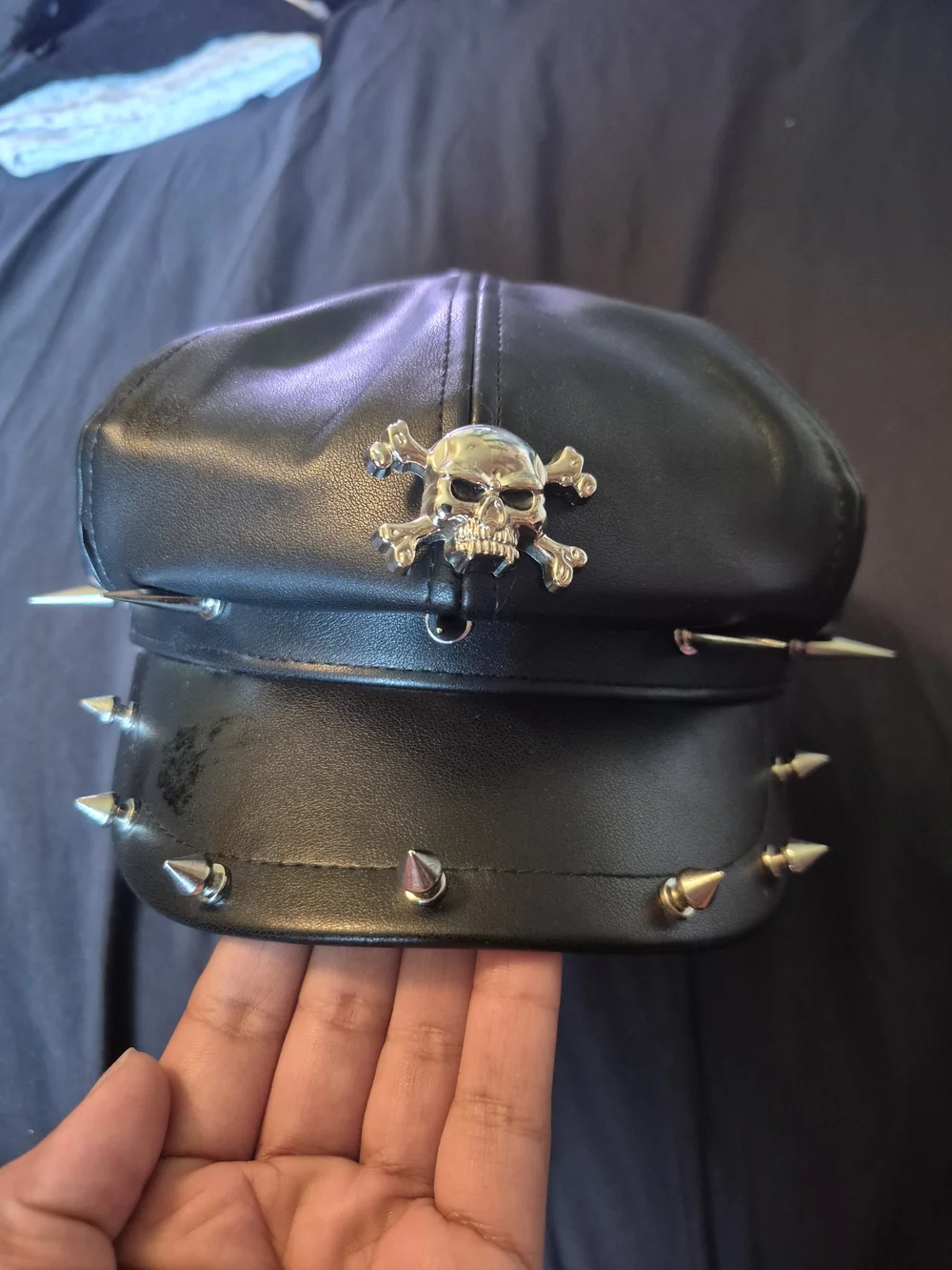 Black Faux Leather Spiked Cap with Skull Accent